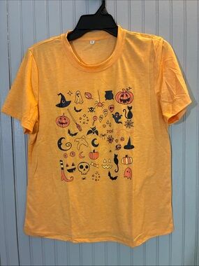 Halloween Icons T-Shirt - Orange. New in package. Women’s medium.